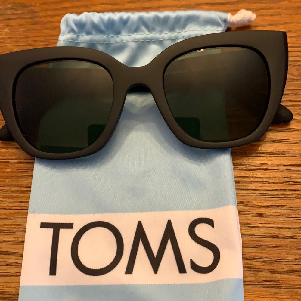 Brand new Tom’s sunglasses with cloth bag